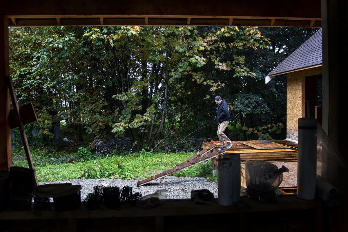 Bill Powers, a semi-retired construction worker, is building his own home in British Columbia. Powers says he uses cannabis to help with shoulder and back pain.