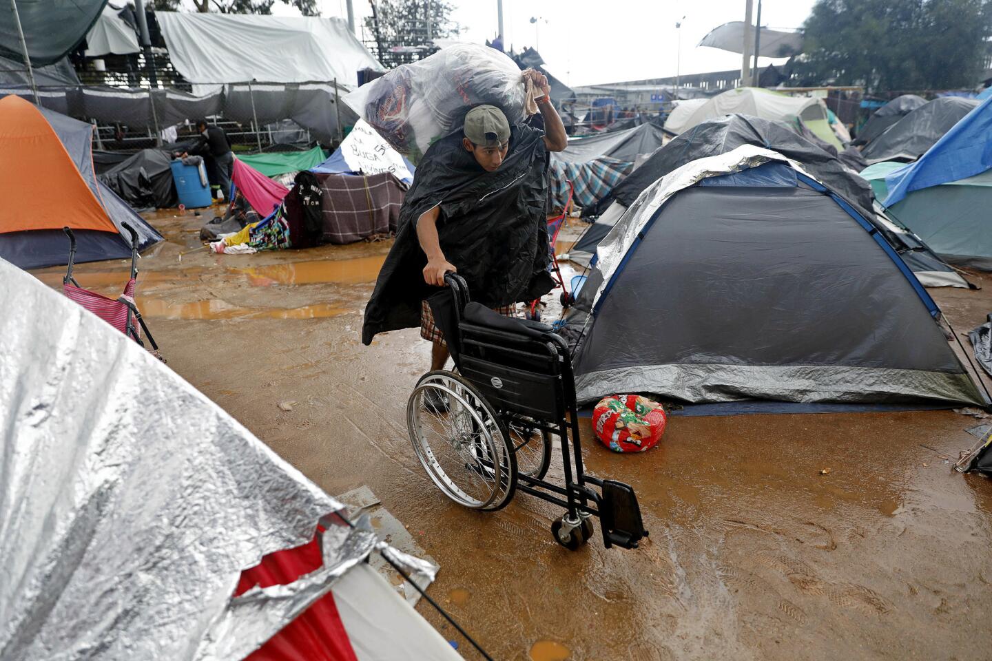 Rain drenches Tijuana migrant camp