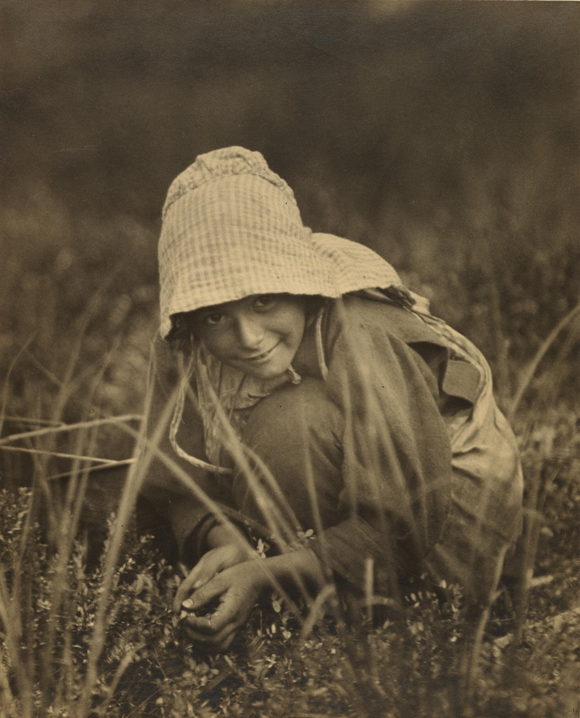 Lewis W. Hine, "Cranberry picker, New Jersey," 1913; gelatin metallic print.