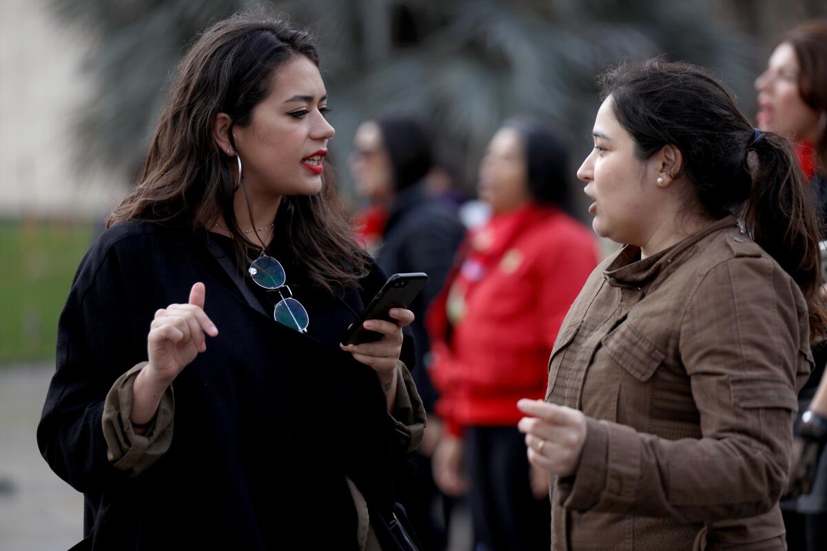 Inger Flem and Caroline Delgado, who helped organize the performance-protest at LACMA