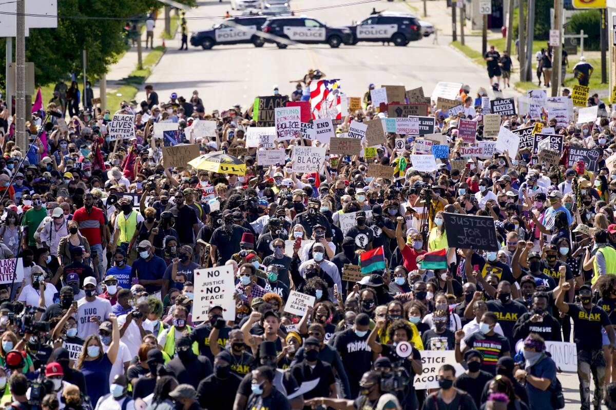 Crowds gather to rally for Jacob Blake on Saturday in Kenosha, Wis.