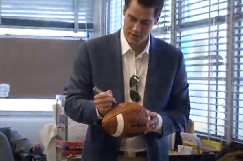 Matt Cassel visiting Chatsworth High in 2011 and having jersey number retired.