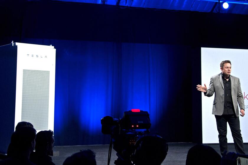 During an event at Tesla’s design studio in Hawthorne, Elon Musk introduces a line of batteries for homes and businesses.