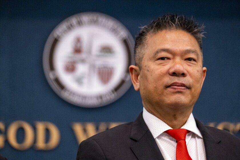 Council Member Tai Do during a rare in-person City Council meeting.