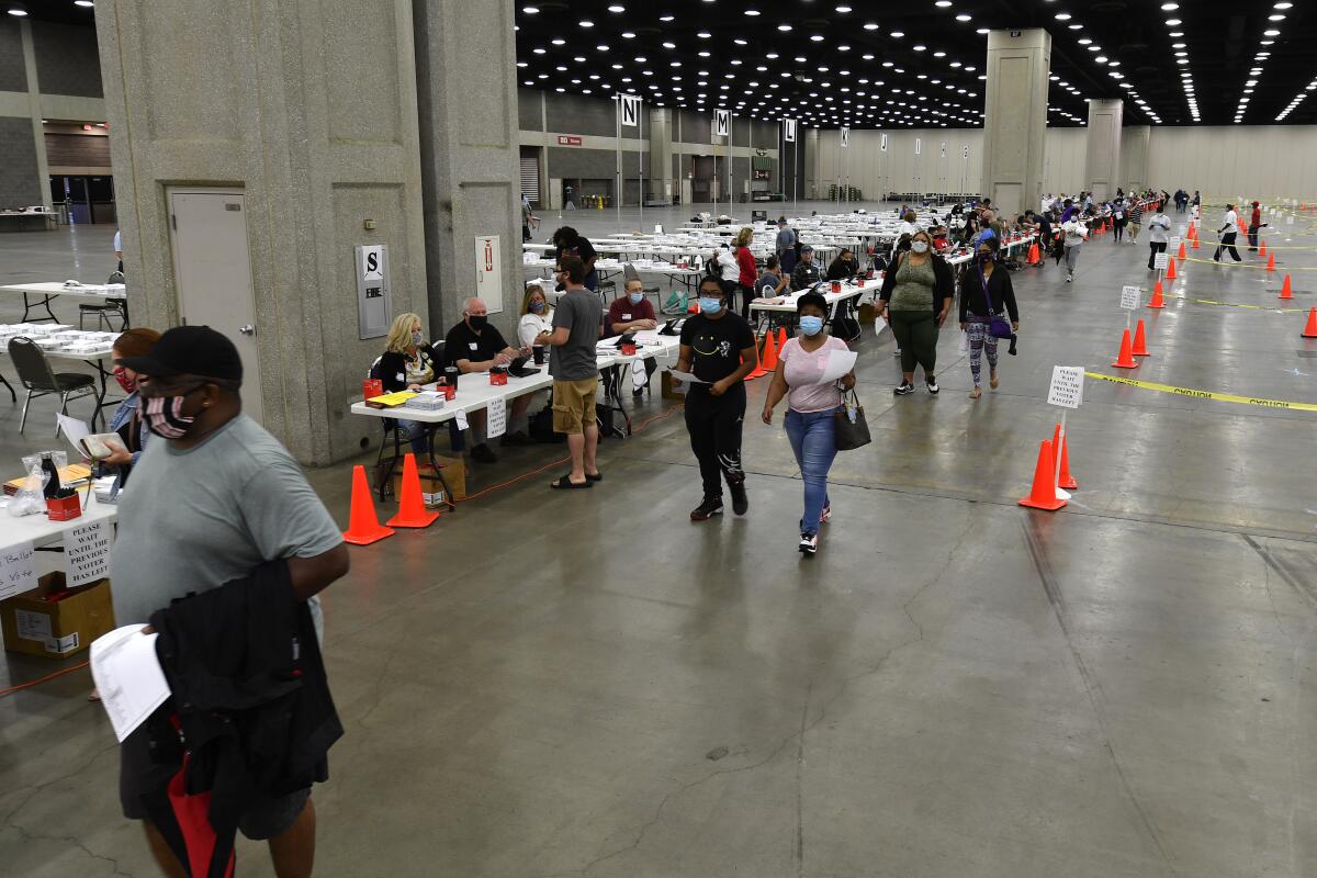 Voters at the Kentucky Exposition Center in Louisville.