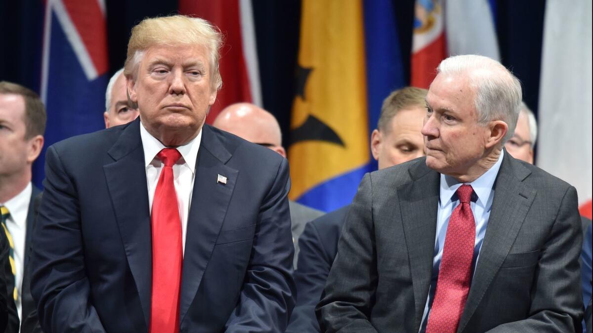 President Trump and Atty Gen. Jeff Sessions, in 2017 photo, have had a frosty relationship ever since Sessions recused himself from the investigation into Russia's interference in the 2016 U.S. presidential election.