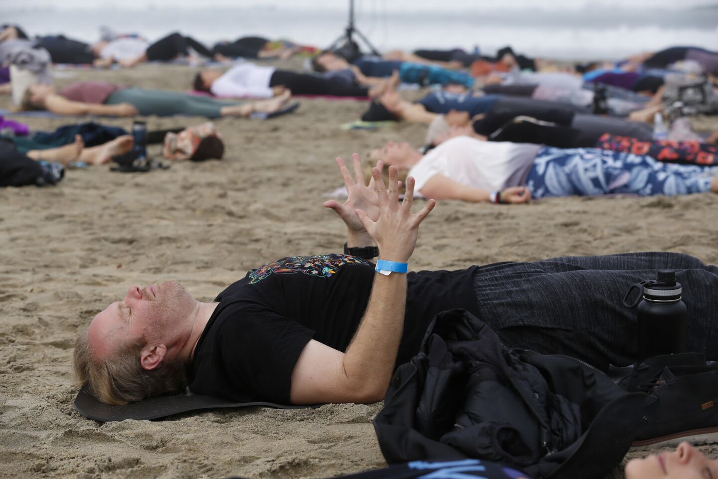 At the San Diego Yoga Festival held in Imperial Beach, several participants took part in the morning yoga session held Sunday on the sand near the Imperial Beach Pier.