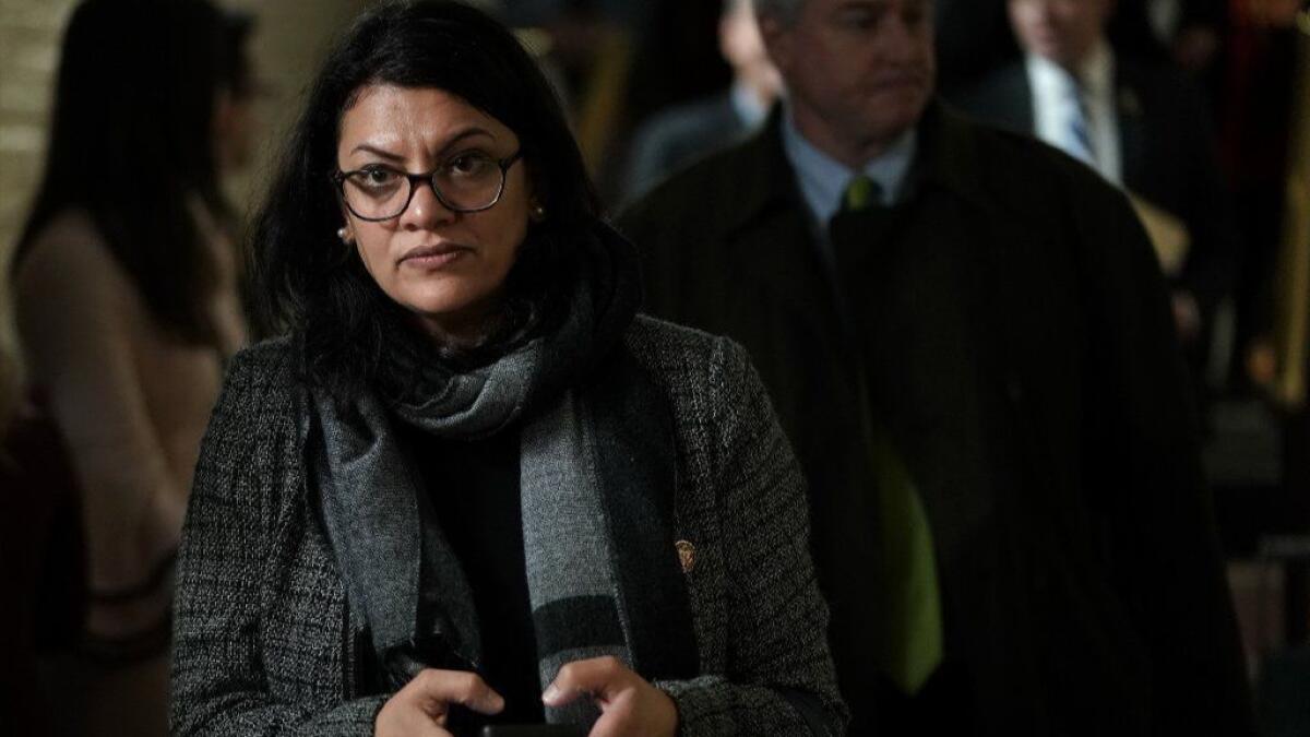 Rep. Rashida Tlaib leaves after a caucus meeting at the U.S. Capitol on Jan. 9.