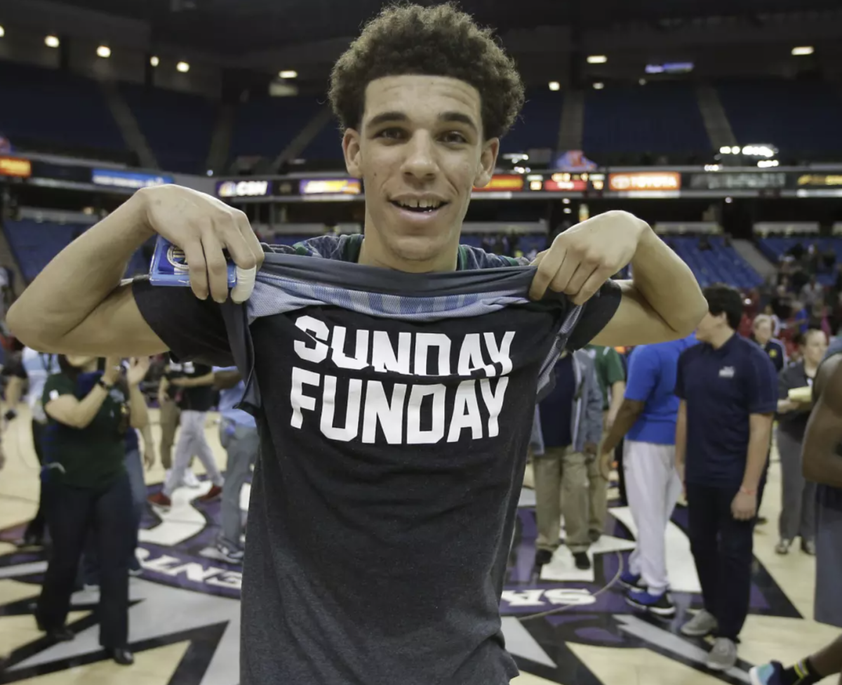 Lonzo Ball shows off his shirt in 2016 after going 35-0 while winning a state championship at Chino Hills High.
