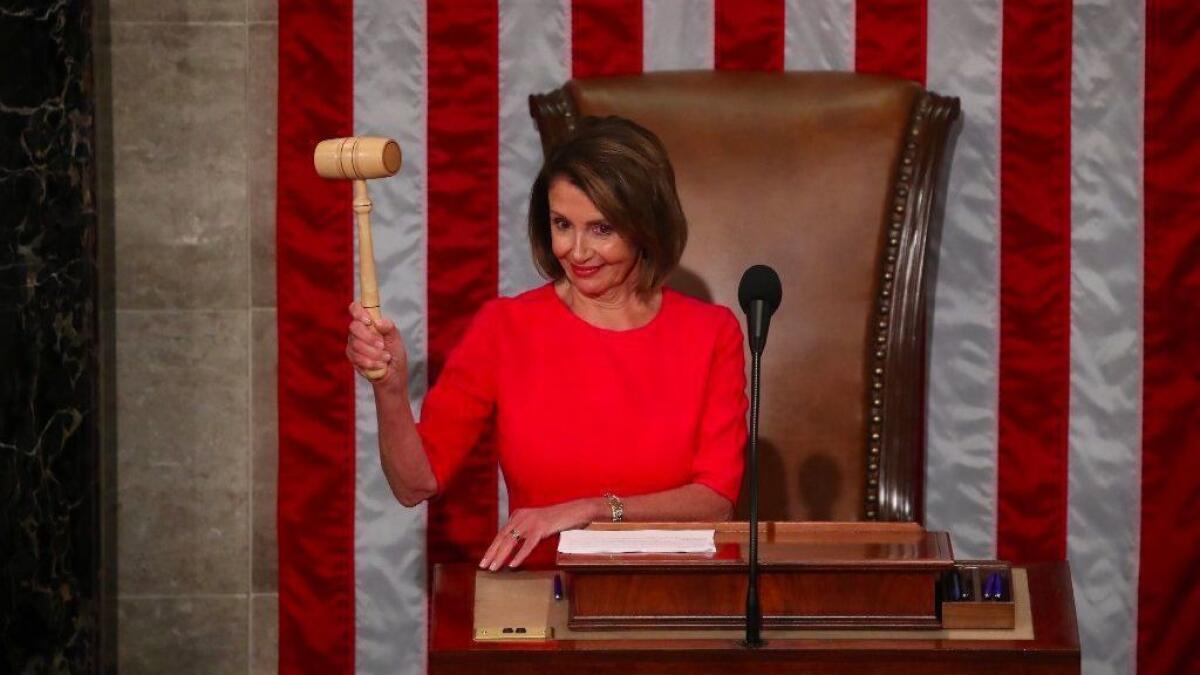 Speaker of the House Nancy Pelosi holds the gavel during the first session of the 116th Congress at the U.S. Capitol.