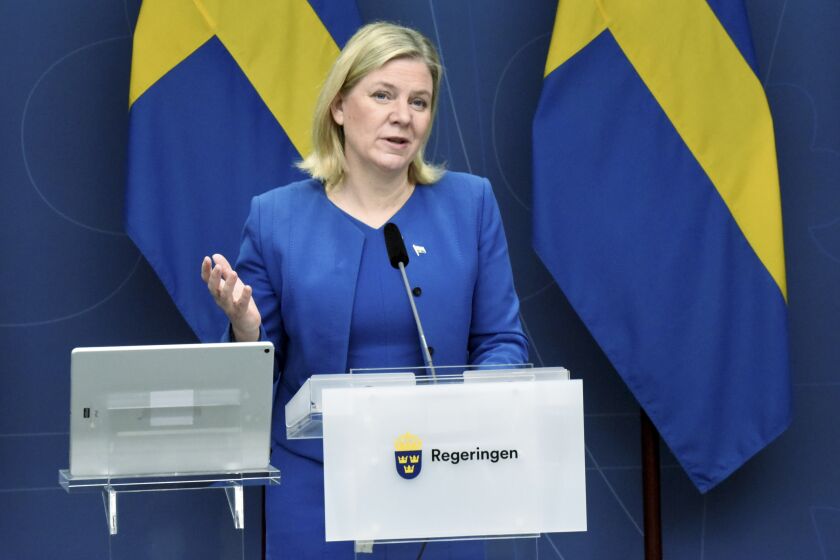 Sweden's Priime Minister Magdalena Andersson announces during a digital press conference that Sweden will lift nearly all Covid-19 restrictions on February 9th, in Stockholm, Thursday, Feb. 3, 2022. (Marko Säävälä/TT via AP)