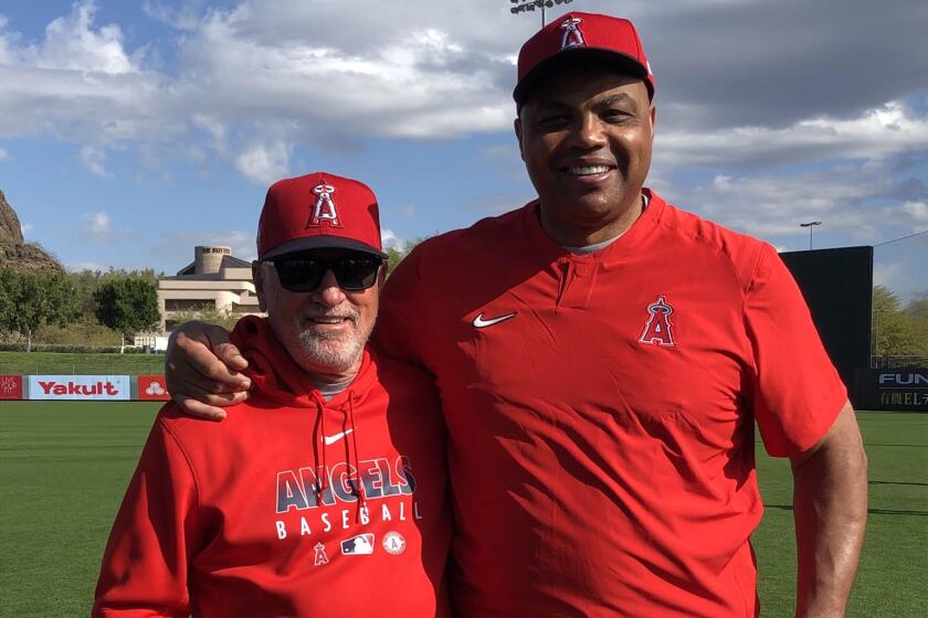 NBA legend Charles Barkley, right, poses for a photo with Angels manager Joe Maddon during Angels training camp at Tempe Diablo Stadium in Tempe, Ariz., on March 2, 2020.