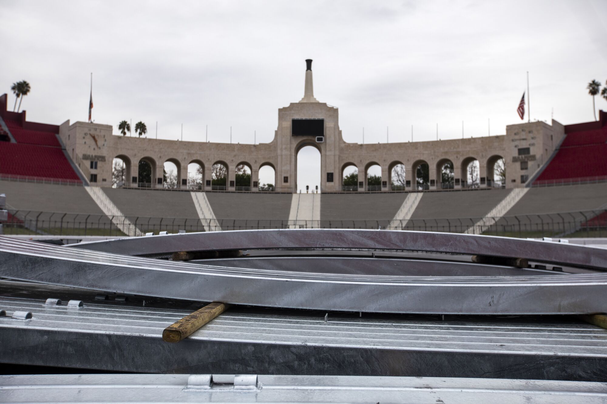 The SAFER barrier lies in the infield while the Los Angeles Memorial Coliseum being converted to a race track.