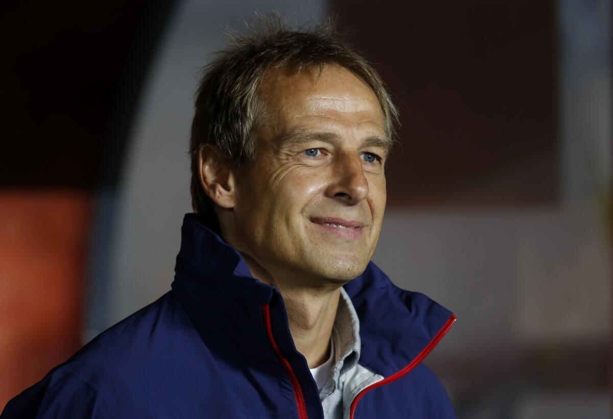 Juergen Klinsmann smiles before a Sept. 3 friendly between the Czech Republic and U.S. national teams in Prague.