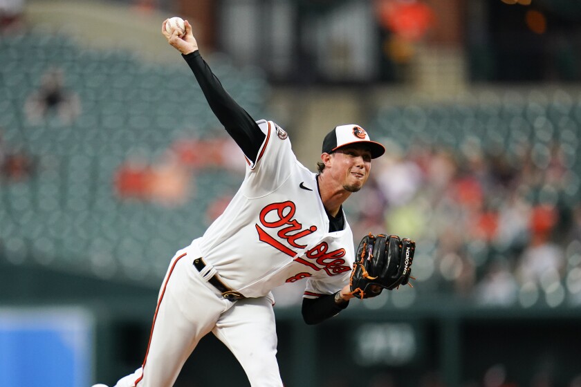 Baltimore Orioles starting pitcher Spenser Watkins throws a pitch to the Texas Rangers during the second inning of a baseball game, Wednesday, July 6, 2022, in Baltimore. (AP Photo/Julio Cortez)