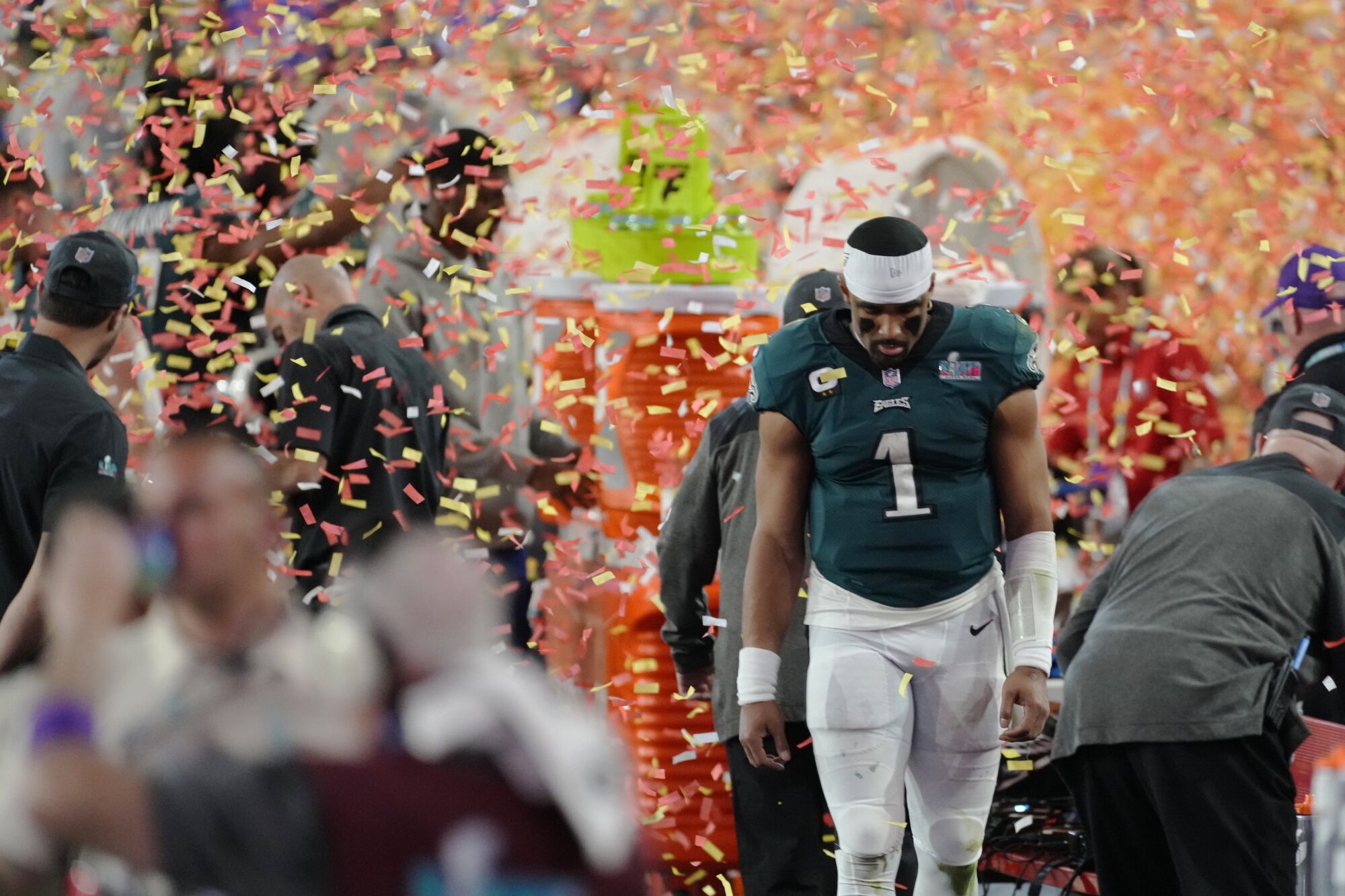Eagles quarterback Jalen Hurts bows his head after losing to the Kansas City Chiefs.