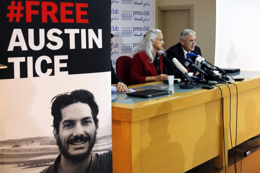 FILE - Marc and Debra Tice, the parents of Austin Tice, who is missing in Syria, speak during a press conference, at the Press Club, in Beirut, Lebanon, Dec. 4, 2018. The Syrian Foreign Ministry denied on Wednesday, Aug. 17, 2022, that it is holding U.S. journalist Austin Tice or other Americans after President Joe Biden accused the Syrian government of detaining him. Tice went missing shortly after his 31st birthday on Aug. 14, 2012 at a checkpoint in a contested area west of the capital Damascus. (AP Photo/Bilal Hussein, File)
