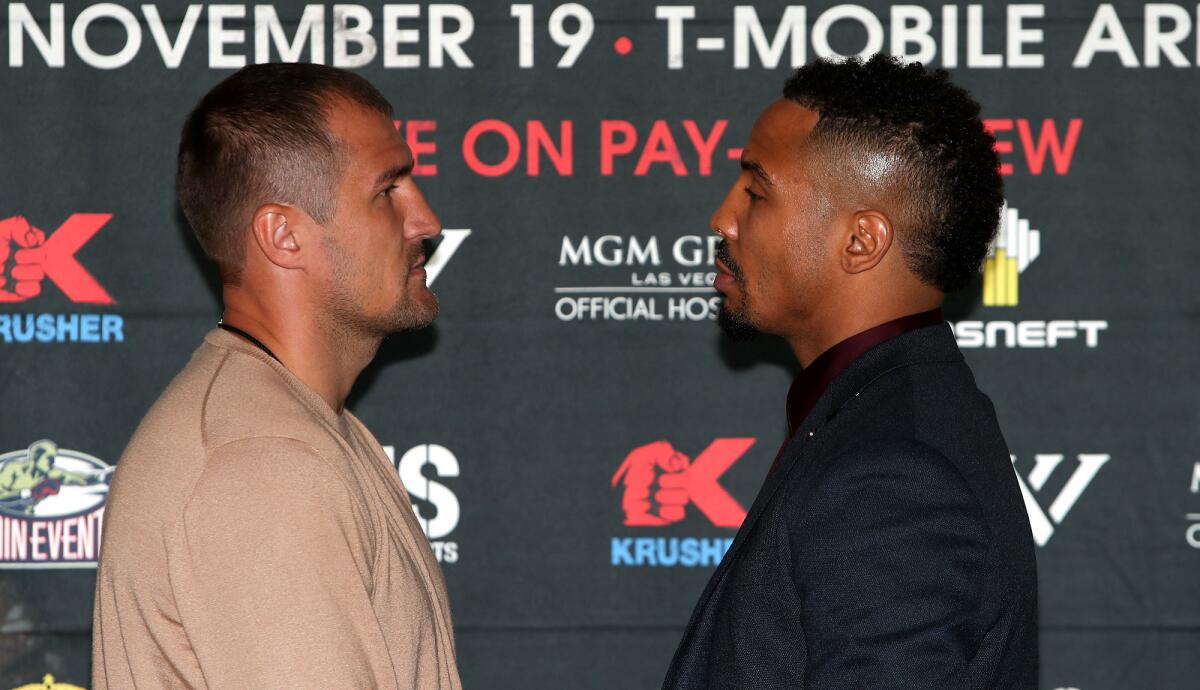 Sergey Kovalev, left, and Andre Ward strike the stare-down pose during a news conference Sept. 6.