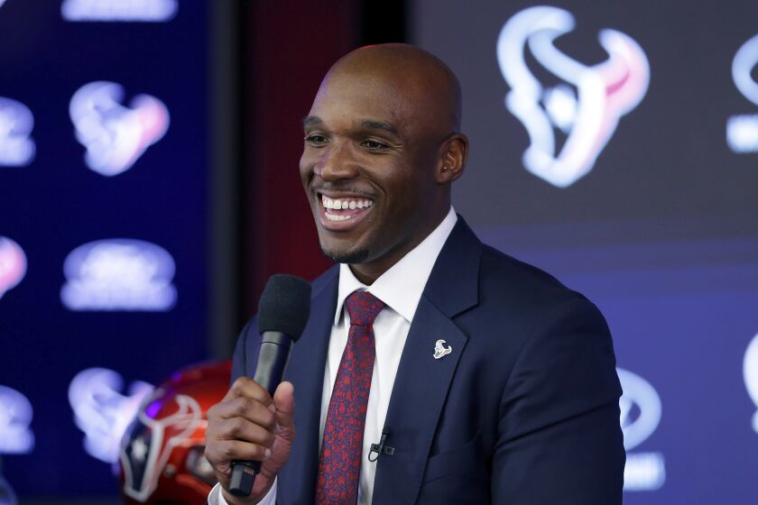 DeMeco Ryans answers questions during a press conference formally announcing Ryans as the new head coach of the Houston Texans at NRG Stadium, Thursday, Feb. 2, 2023, in Houston. (AP Photo/Michael Wyke)