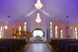 Decorations adorn The Wedding Chapel at Vegas Weddings on Tuesday, Dec. 19, 2023, in Las Vegas. The Las Vegas Review-Journal reports that New Year’s Eve could take the cake for the busiest wedding day in Las Vegas thanks to the date's repeating pattern of 1-2-3-1-2-3. That's known as a specialty date for those who work in the massive Las Vegas wedding industry. (Bizuayehu Tesfaye/Las Vegas Review-Journal via AP)