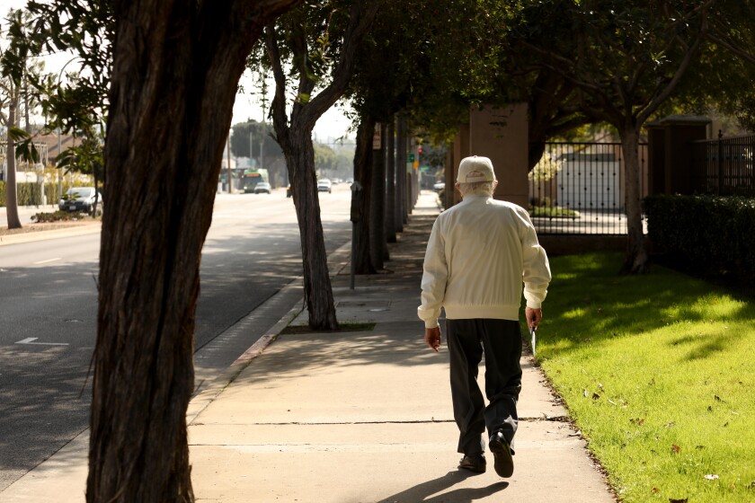 Joe Goldfarb strolls down Overland Avenue