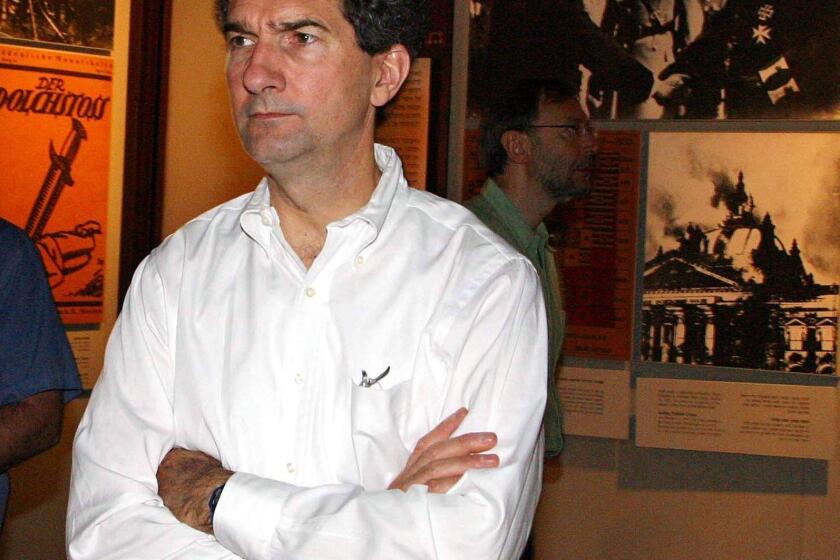 Cameron Kerry during a 2004 tour of the Yad Vashem Holocaust Memorial in Israel.