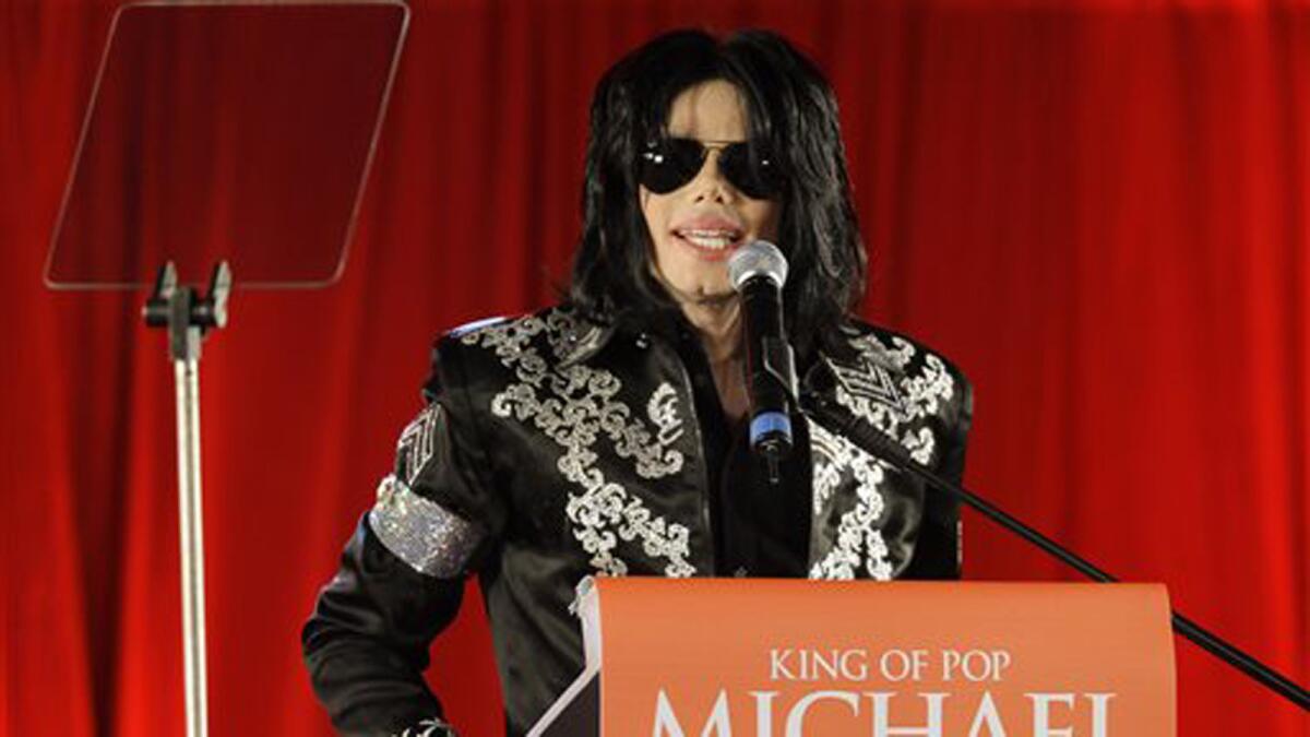 Michael Jackson speaks at a 2009 news conference regarding his ill-fated "This Is It" comeback tour. Three of Jackson's nephews filed a lawsuit alleging defamation by an online tabloid.