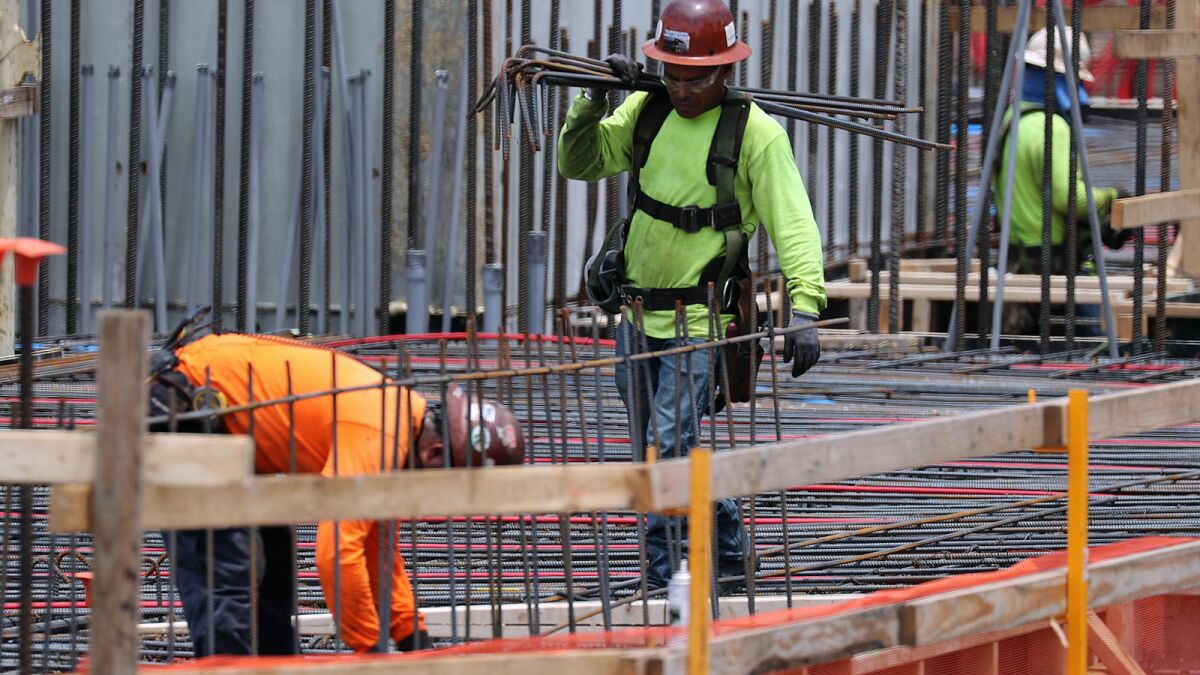 Construction workers in Fort Lauderdale, Fla., in May