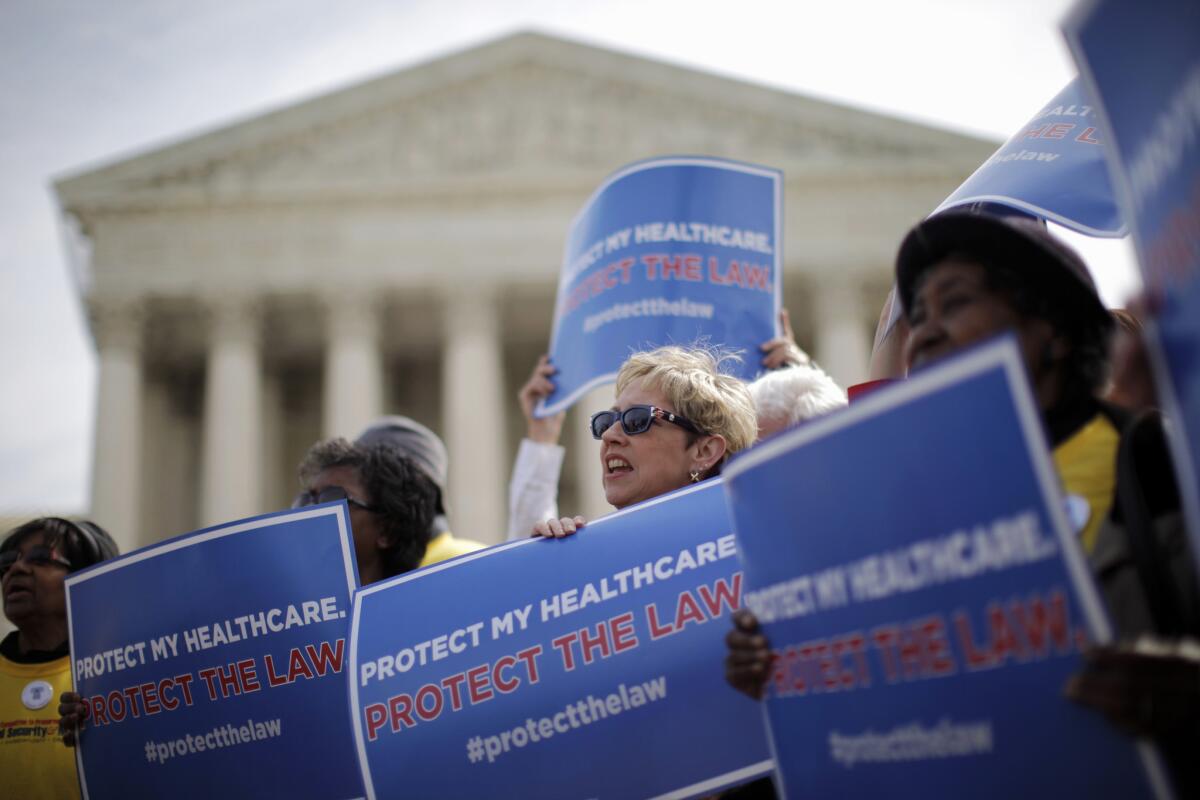 Supporters of healthcare reform rally in front of the Supreme Court in Washington on March 12, 2012. The justices are expected to decide this month on the fate of insurance subsidies for millions of people who live in states with federally run exchanges.