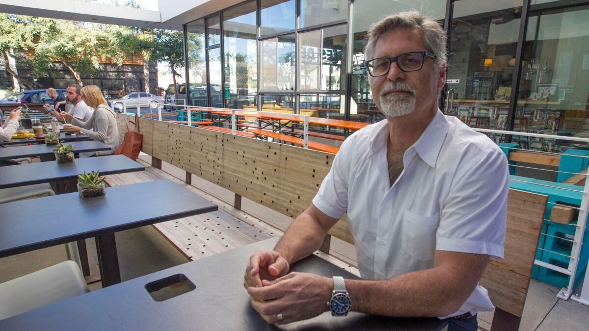 Architect and developer Jonathan Segal at one of his mixed-used projects. (John Gibbins / Union-Tribune)