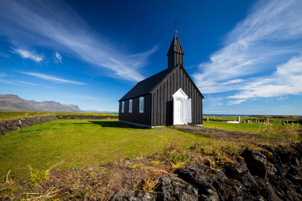 Iceland | Marsha Chan, La Cañada FlintridgeChan spied this rural church on a photography tour of Iceland. As she shot with a Canon 5D Mark IV, a wedding party appeared on the road. She snapped pictures of them too, but she liked the bare building and landscape better.
