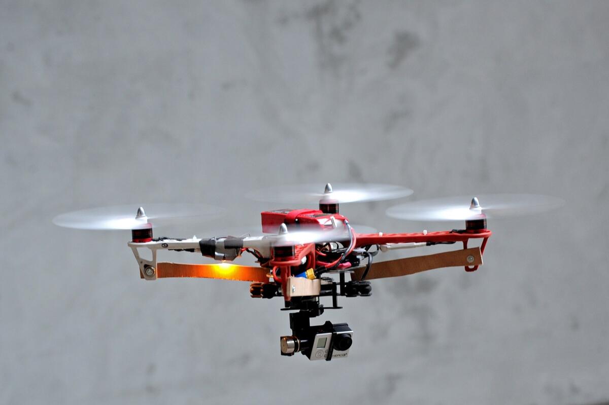 A drone prototype equipped with a GoPro camera.