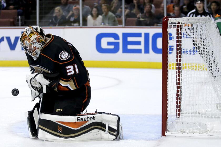 Ducks goalie Frederik Andersen blocks a shot by the Avalanche in the first period of a preseason game Monday night in Anaheim.