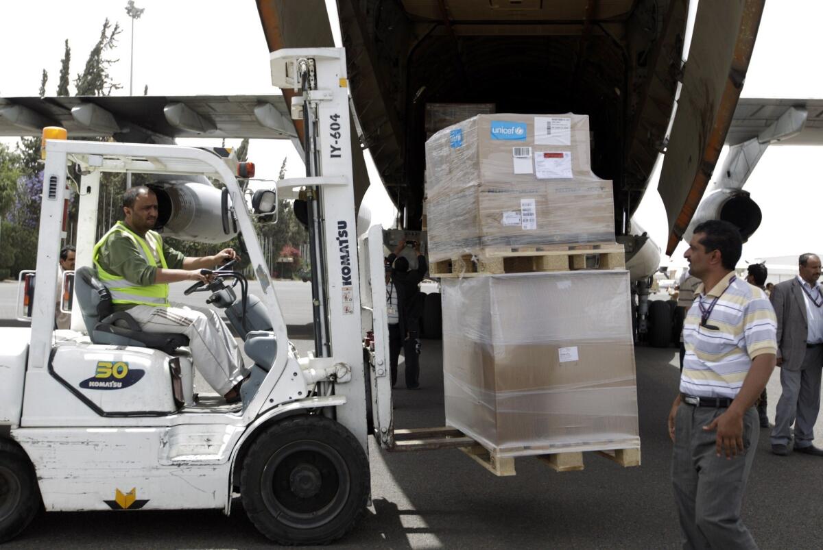 Emergency medical aid from UNICEF is unloaded from a plane at the international airport in Sana, Yemen, on Friday.