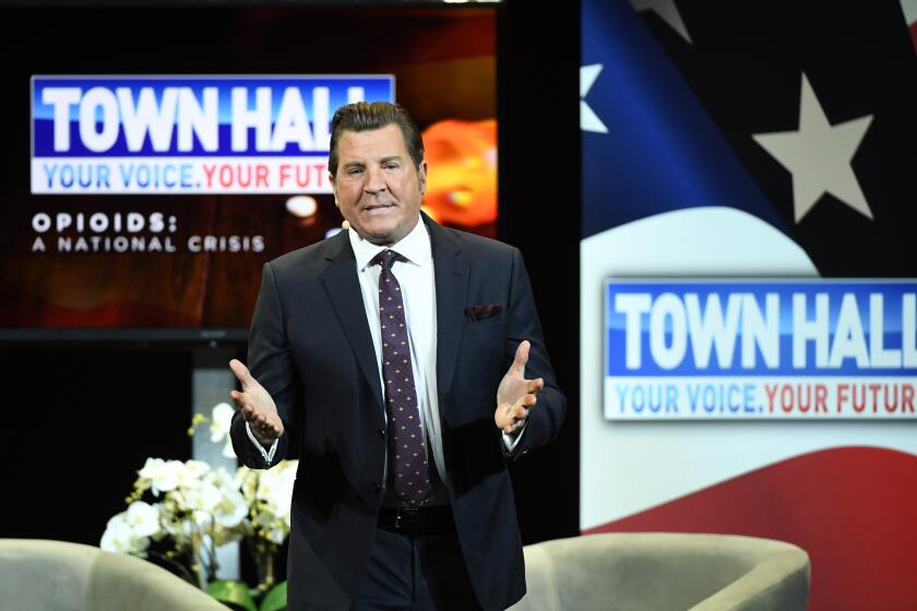 Television personality Eric Bolling speaks during a town hall meeting on the opioid crisis 