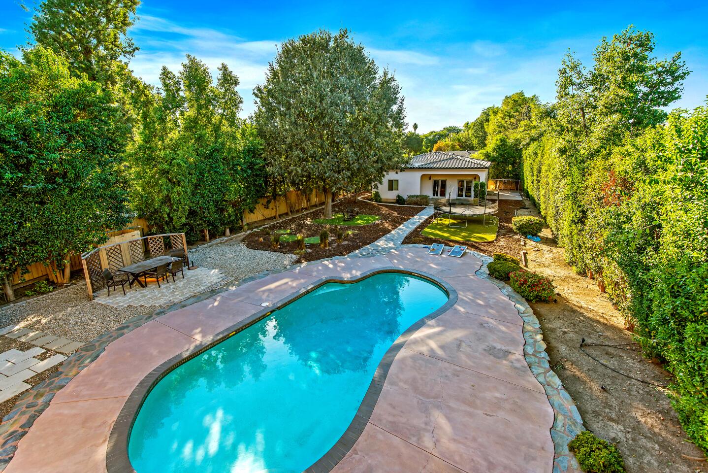 Derek Fisher's half-acre spread includes a Mediterranean-style home, a swimming pool and a guesthouse at the far end of the property.