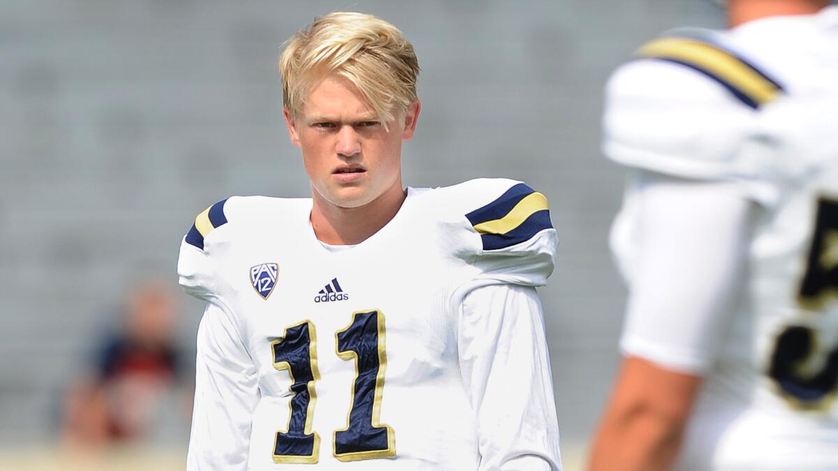 UCLA quarterback Jerry Neuheisel looks on before a game against Virginia on Aug. 30, 2014.