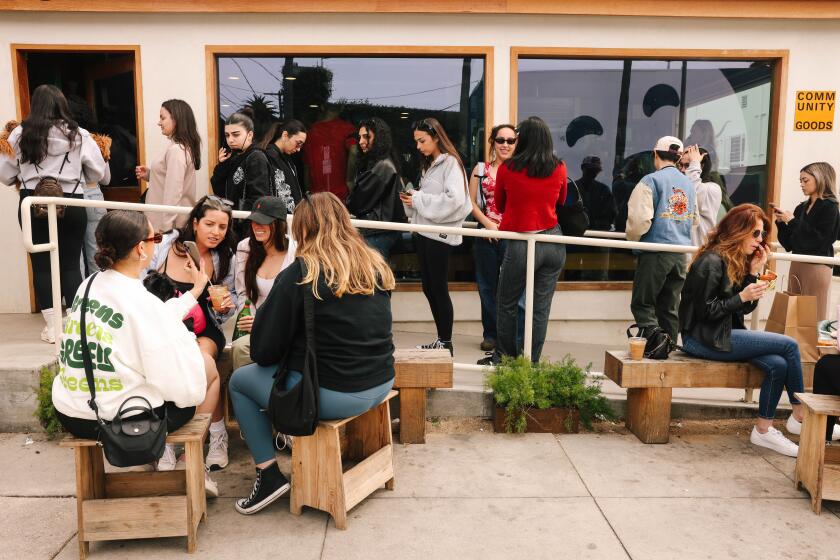 Los Angeles, CA - February 25: People wait in lines to order while others eat at tables outside at Community Goods on Sunday, Feb. 25, 2024 in Los Angeles, CA. (Dania Maxwell / Los Angeles Times)