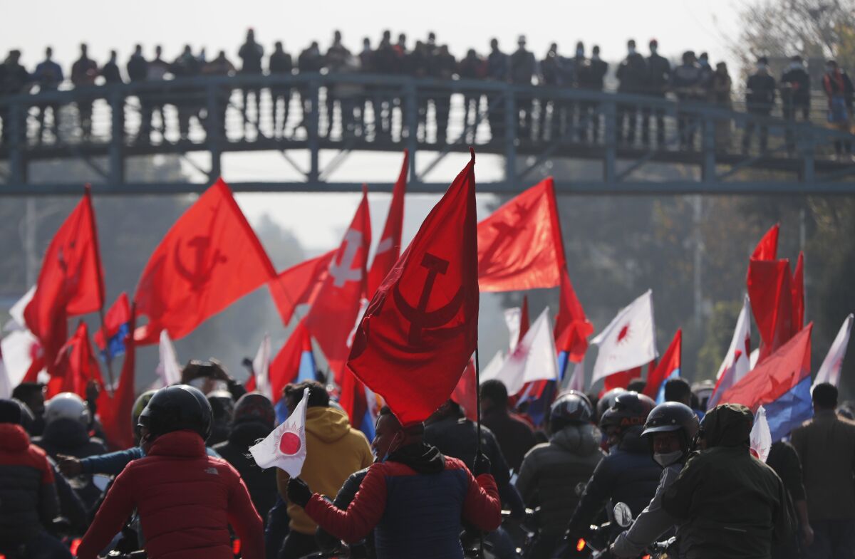 Nepalese supporters of the splinter group participate in a protest in Kathmandu, Nepal, on Tuesday.