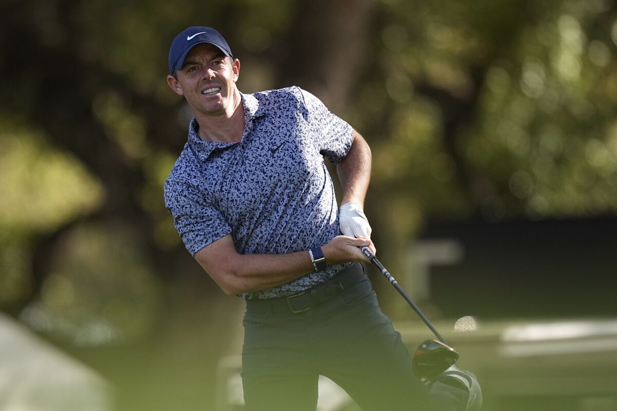 Rory McIlroy, of Northern Ireland, reacts to his drive on the eighth hole during a round of 16 at the Dell Technologies Match Play Championship golf tournament in Austin, Texas, Saturday, March 25, 2023. (AP Photo/Eric Gay)