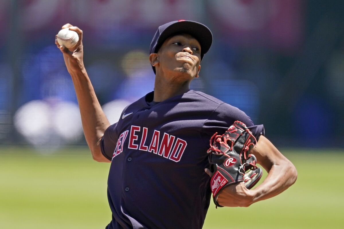 Cleveland Indians starting pitcher Triston McKenzie throws during the first inning of a baseball game against the Kansas City Royals Thursday, May 6, 2021, in Kansas City, Mo. (AP Photo/Charlie Riedel)