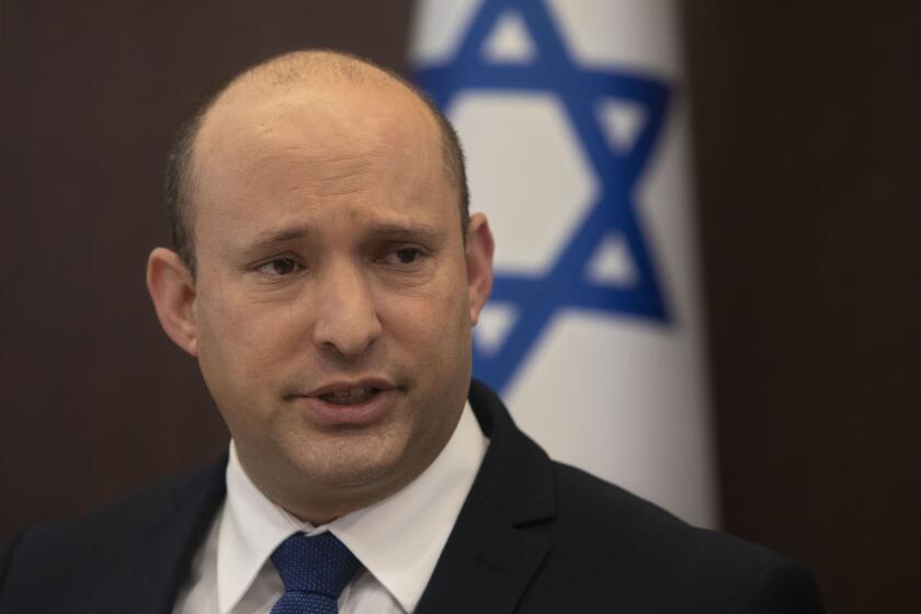 Israeli Prime Minister Naftali Bennett speaks during the weekly cabinet meeting at the Prime Minister's office in Jerusalem, Sunday, Sept. 5, 2021. (AP Photo/Sebastian Scheiner, Pool)