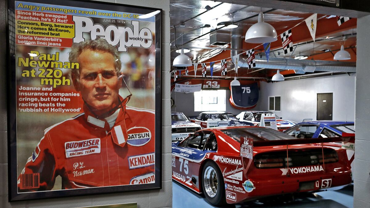 Paul Newman memorabilia adorns Adam Carolla's garage.
