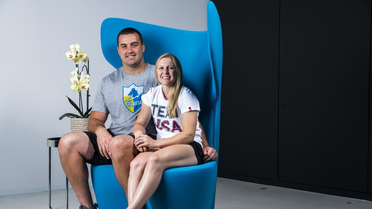 Husband and wife Michael Schofield, of the Los Angeles Chargers, and Kendall Coyne, of the U.S. Olympic Hockey Team, both pose for a portrait at Hoag Performance Center in Costa Mesa.