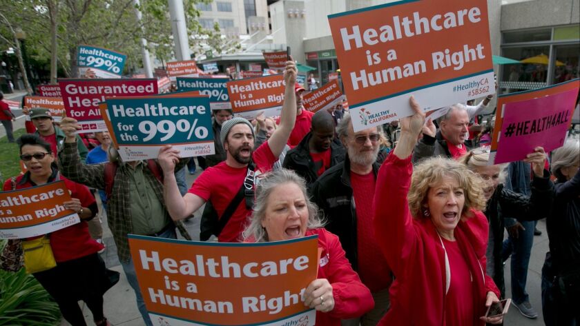 Supporters of single-payer healthcare march in Sacramento in April 2017. A proposal by a progressive think tank would bring universal coverage to the U.S. nationwide.