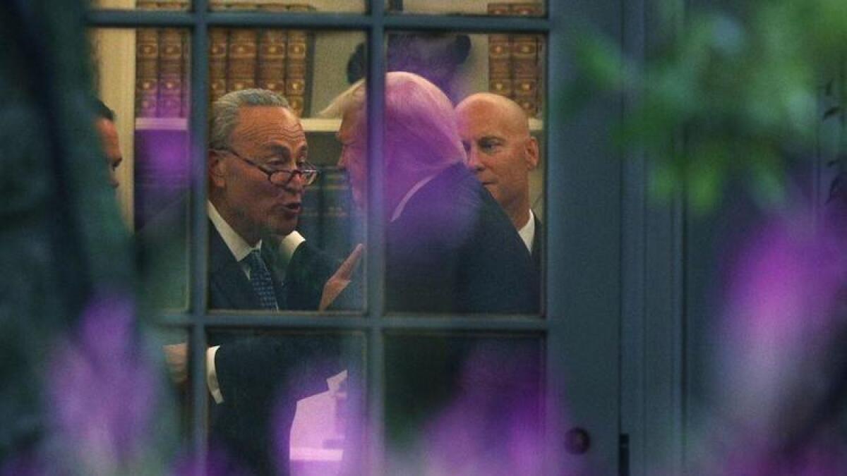 Senate Minority Leader Charles E. Schumer (D-N.Y.) with President Trump in the Oval Office.