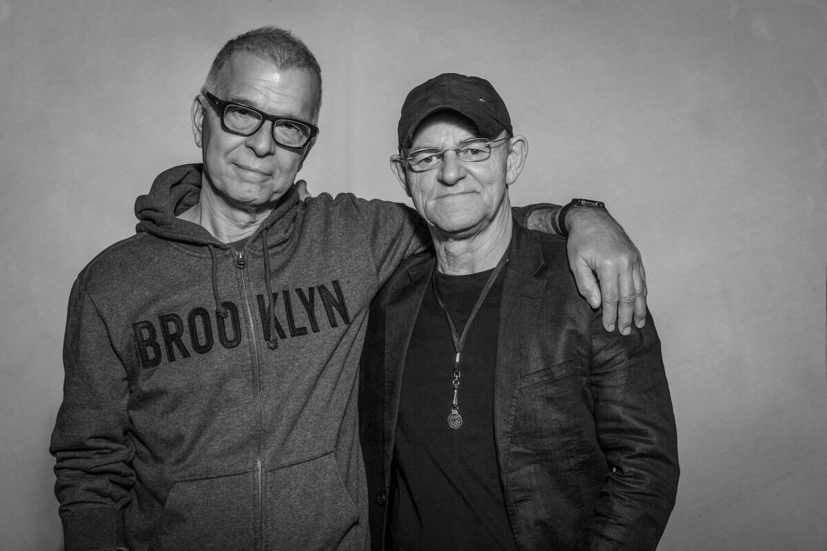 Bass player Tony Visconti (left) and drummer Woody Woodmansey both played with David Bowie. They play in San Diego Sunday at the Music Box with their Bowie tribute band, Holy Holy. Courtesy photo