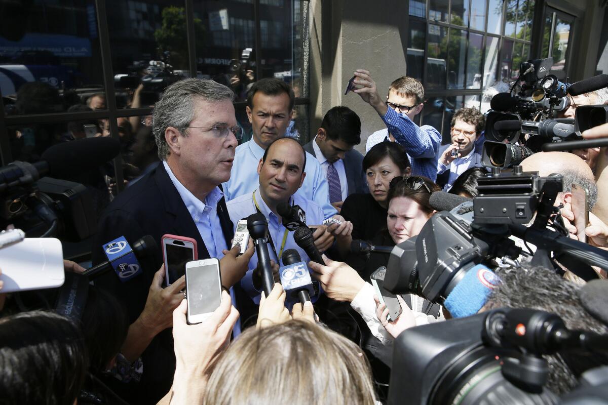 Republican presidential candidate Jeb Bush speaks to reporters in San Francisco in July. A number of GOP candidates have vowed to rescind the agreement with Iran, some on their first day in office.