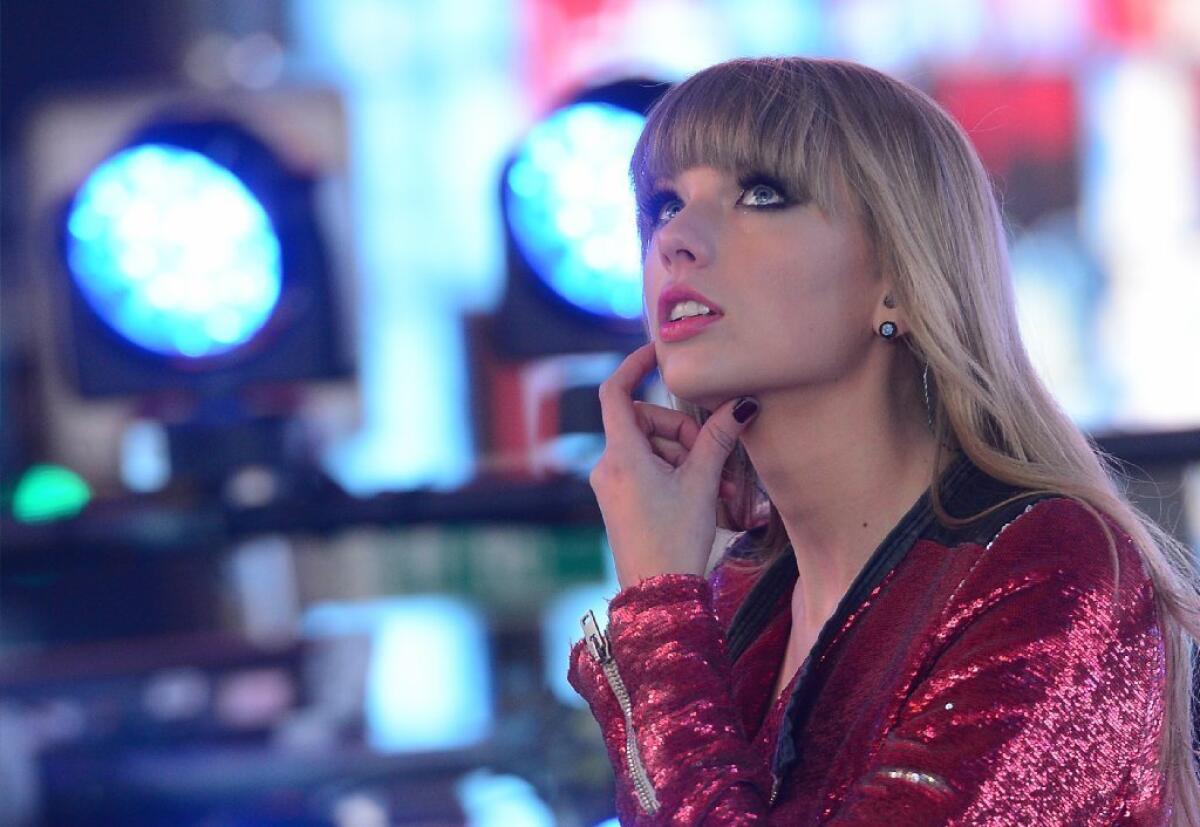 Taylor Swift rings in the new year with the knowledge that her record "Red" was the second-best selling album of 2012.