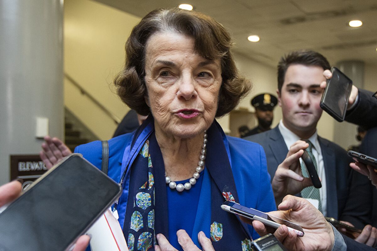 Sen. Dianne Feinstein fields reporters' questions at the U.S. Capitol last month.